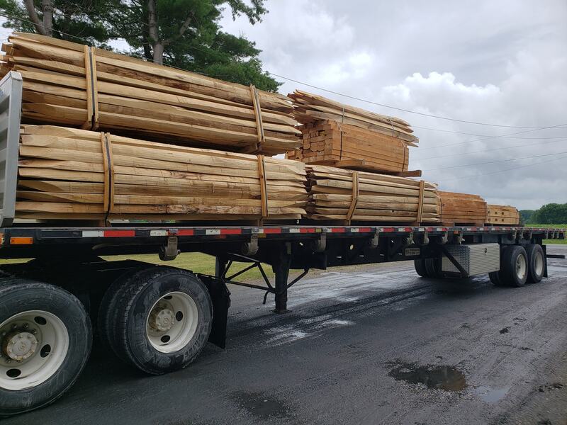 Lumber truck filled with fencing wood